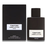 Frasco y estuche de Tom Ford Ombre Leather Parfum 100 ml – El frasco negro con detalles minimalistas se presenta junto a un estuche igualmente elegante y sobrio, resaltando el logotipo de Tom Ford. Esta combinación de lujo muestra la exclusividad del perfume.